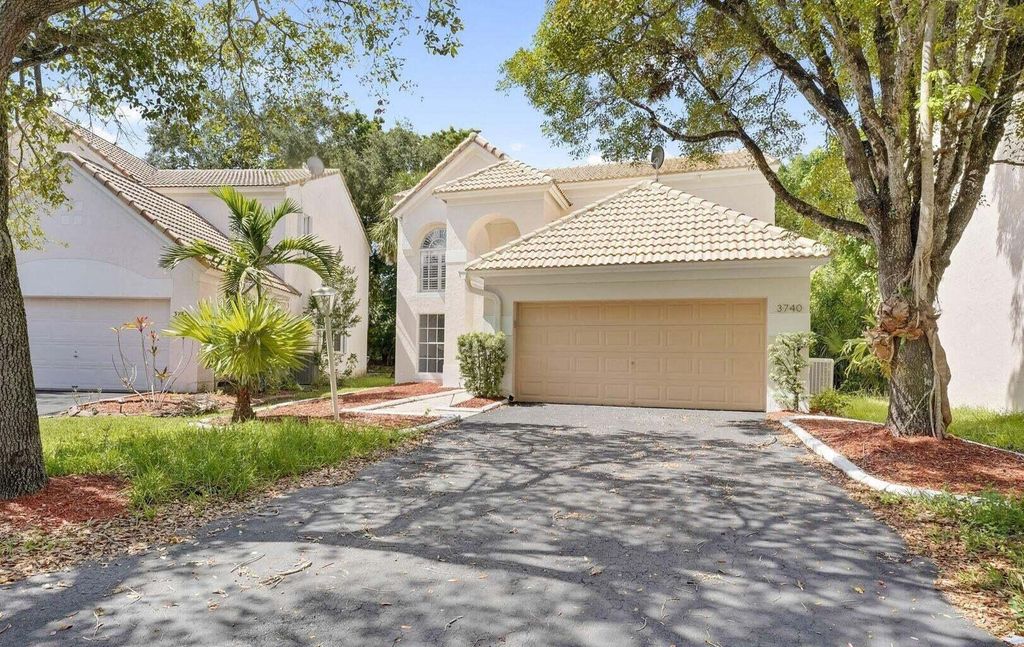 Photo of 3740 Wilderness Way, Coral Springs, FL 33065 (MLS # R10915086)