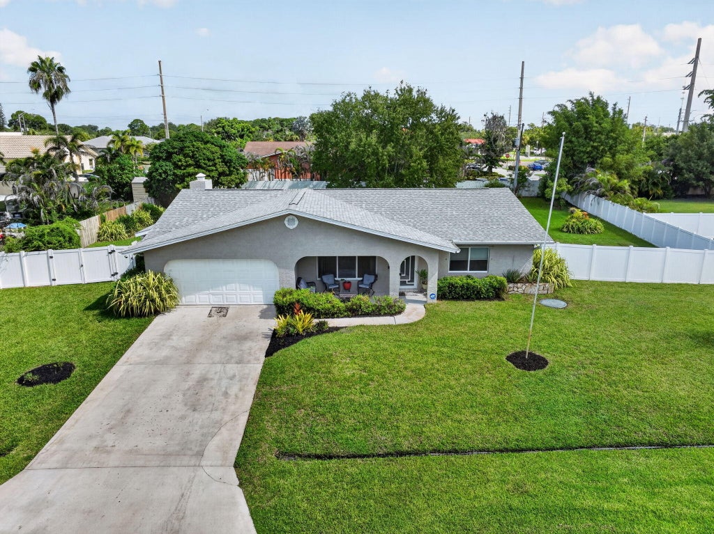 Photo of 2381 SE Delano Road, Port Saint Lucie, FL 34952 (MLS # B26069800)