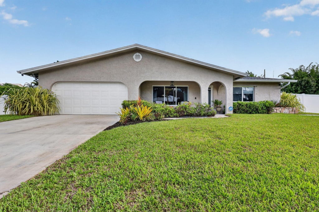 Photo of 2381 SE Delano Road, Port Saint Lucie, FL 34952 (MLS # B26069800)