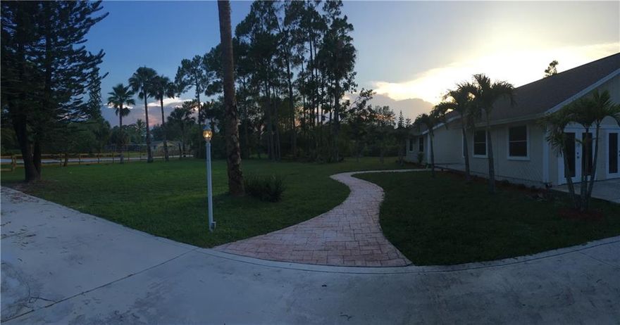 Completely remodeled fenced home on a 1.25 acre lot with No Pond. Designed with Upscale finishes, New Impact windows and doors, Split floor plan with new Rectified Porcelain tiles throughout New custom open concept kitchen with New appliances, Remodeled M aster and Guest Bathrooms, New air conditioning system, New water system, Patio overlooking large pool with beautiful Landscaping. Two vehicle garage, Extra large concrete driveway. Beautiful home and great for entertaining with Great location.