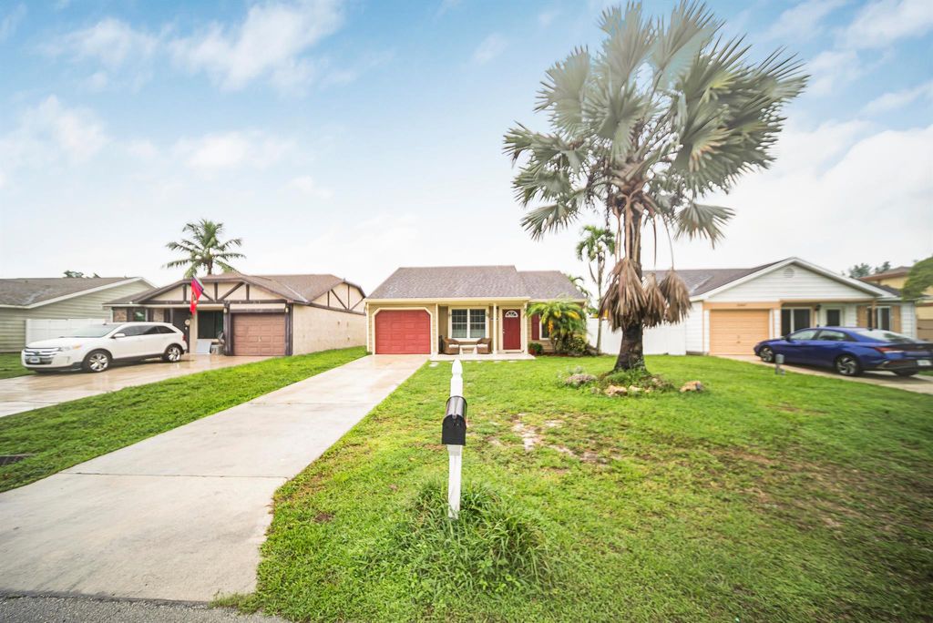 Photo of 22943 Sandalfoot Boulevard, Boca Raton, FL 33428 (MLS # R11116596)