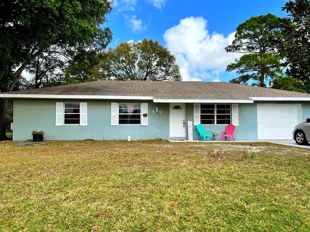 Photo of 555 SW Butler Avenue, Port Saint Lucie, FL 34983 (MLS # R10778933)