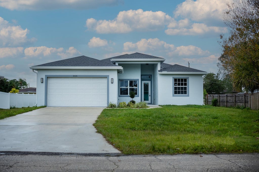 Photo of 2026 SW Aquarius Lane, Port Saint Lucie, FL 34983 (MLS # R10948600)