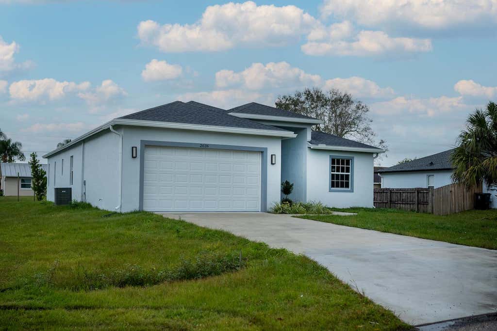 Photo of 2026 SW Aquarius Lane, Port Saint Lucie, FL 34983 (MLS # R10948600)