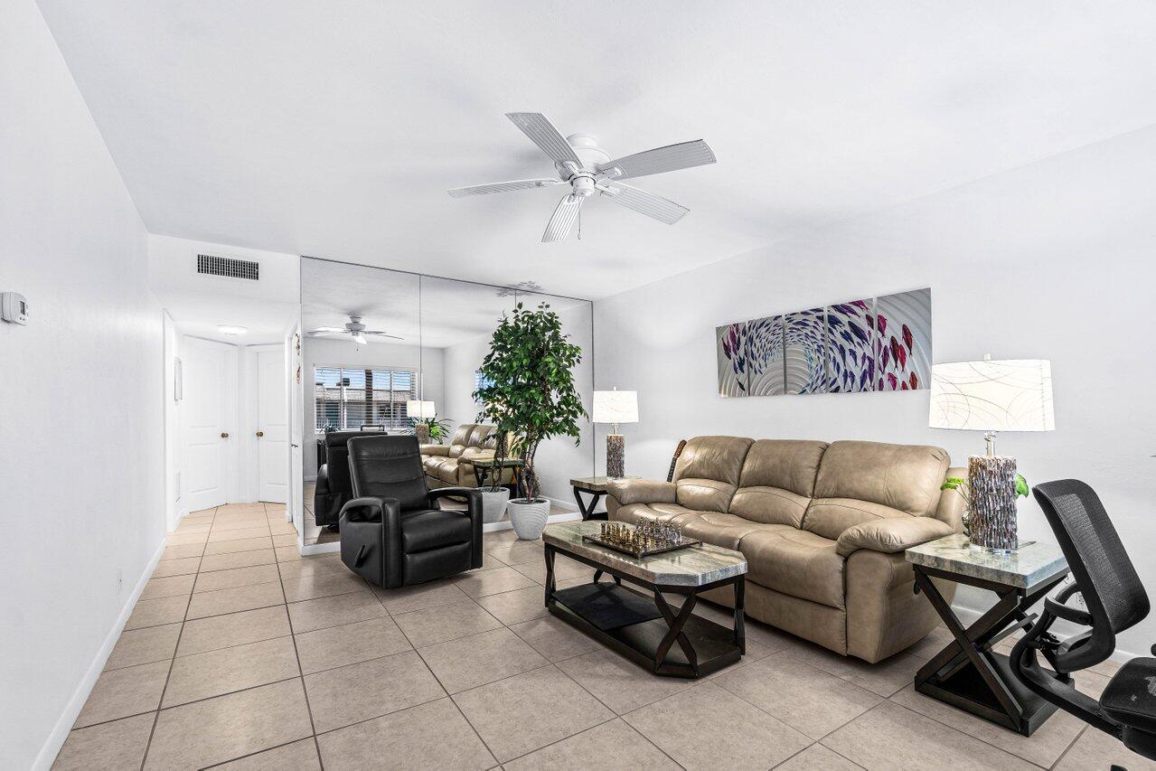 This is the 2 bedroom 2 bathroom unit in Murry Hills you have been waiting for! Views of Lake Osborne from your front and rear patio. Newly remodeled and in fantastic condition this unit is exceptional light & bright, super clean and has a washer/dryer in unit! Accordion shutters on the front plus a nice rear screened patio with extra storage. Cable included and one designated parking spot. Furnishings negotiable. Beautiful well managed 55+ complex with many activities, a heated pool, exercise rooms, grill area, library, arts and crafts, auditorium, billiards, ping pong, putting green, woodworking shop, bocce ball, shuffleboard, car washing area and sauna. Next to Lake Osborne and only minutes from the beach! No leases for the first 2 years, must have a credit score of 700+ and no pets.