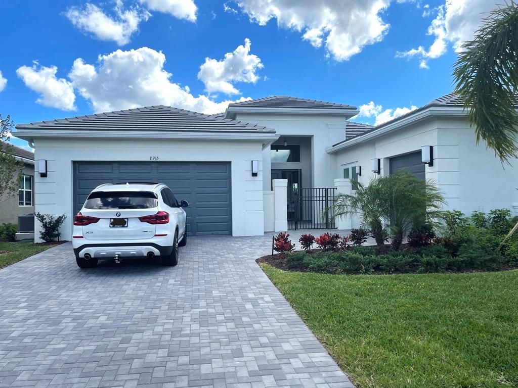 Photo of 11965 SW Sailfish Isles Way, Port Saint Lucie, FL 34987 (MLS # R10794684)
