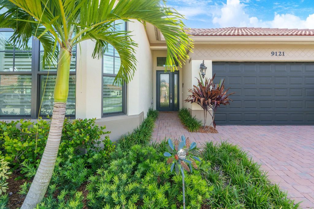 Photo of 9121 Porto Way, Parkland, FL 33076 (MLS # F10549924)