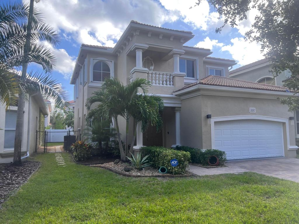 Photo of 224 Gazetta Way, West Palm Beach, FL 33413 (MLS # R11031228)