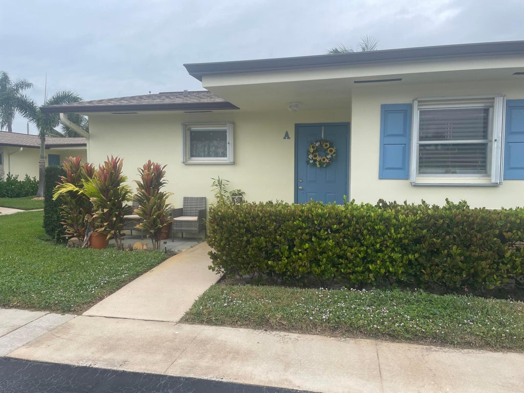 Photo of 2864 E Crosley Dr Drive E #A, West Palm Beach, FL 33415 (MLS # B26027926)