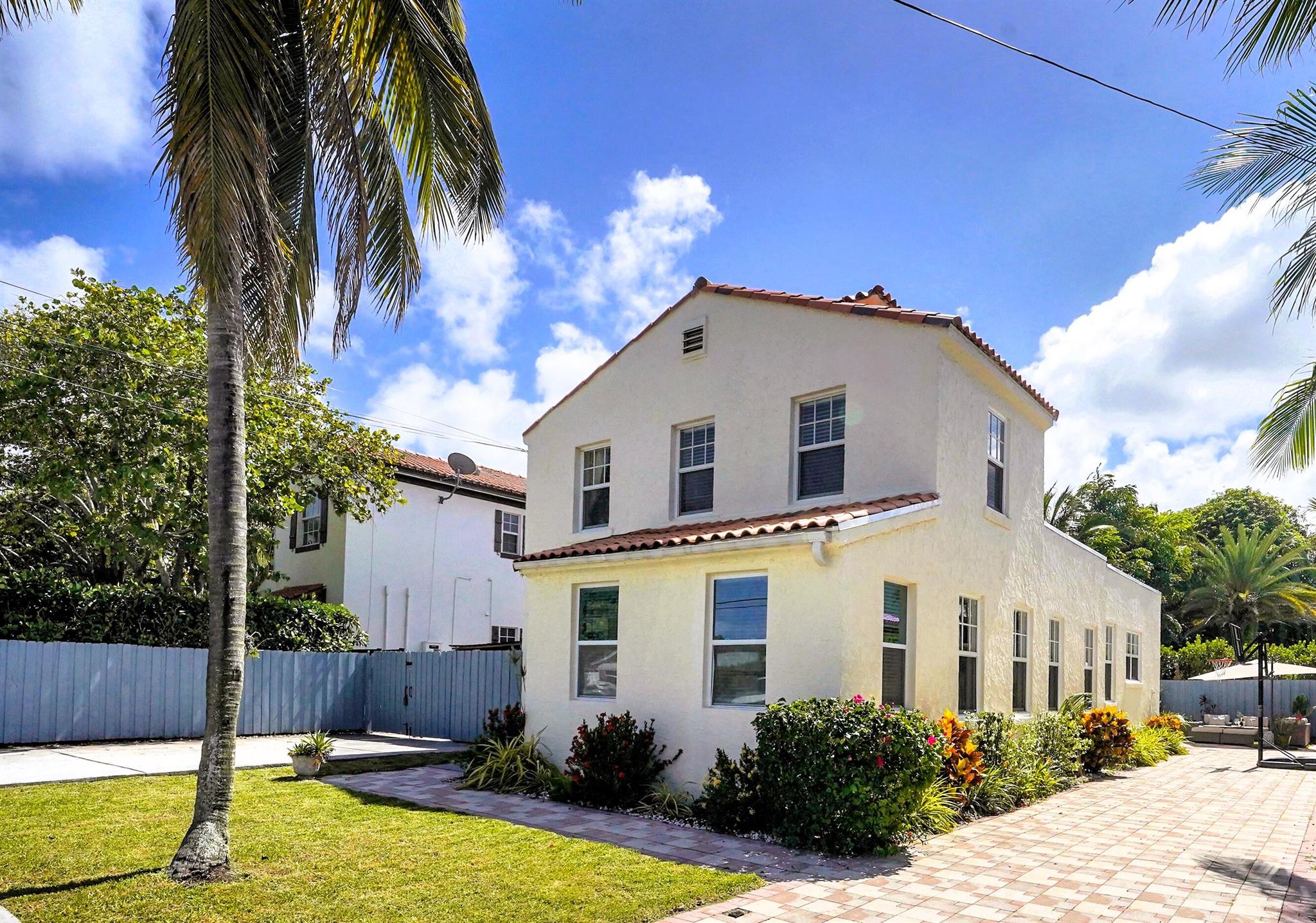 Charming and Historic, this beautifully preserved home is ideally located just a few blocks from vibrant Atlantic Avenue and Delray Beach's stunning coastline. Inside, you'll find original heart pine wood floors, a fully functional wood-burning fireplace, and thoughtfully maintained architectural details that reflect the home's unique character. The layout includes three spacious bedrooms (the entire 2nd floor is a master suite) and two bathrooms, with plenty of natural light and a welcoming atmosphere throughout. Whether you're looking for a fully furnished residence or prefer to bring your own pieces, furnished or unfurnished to suit your needs. W/D are included, and driveway parking. Now available for rent. Very easy to show.