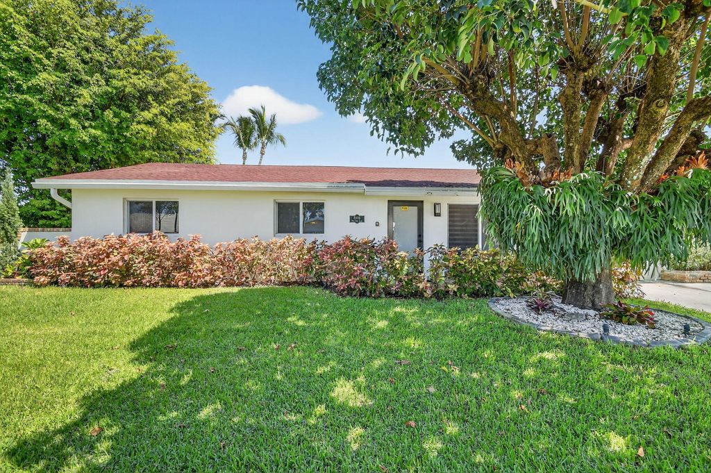 Photo of 8416 Pine Tree Lane, West Palm Beach, FL 33406 (MLS # B26007600)