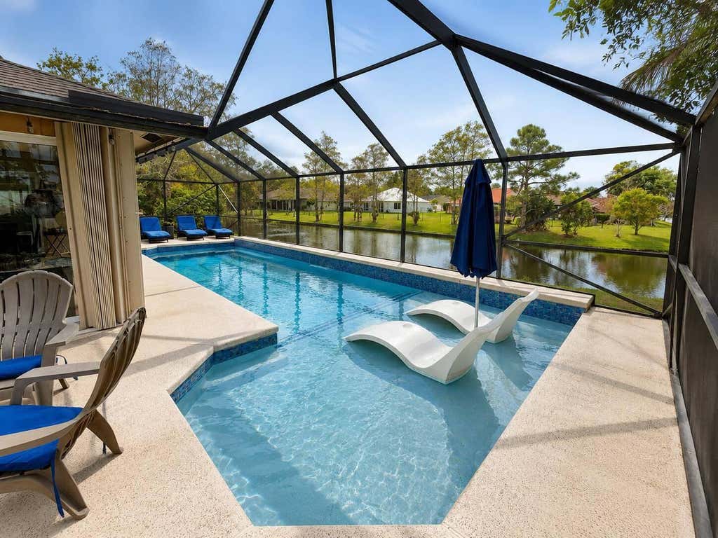 Photo of 111 Camelot Court, Royal Palm Beach, FL 33411 (MLS # B26053751)