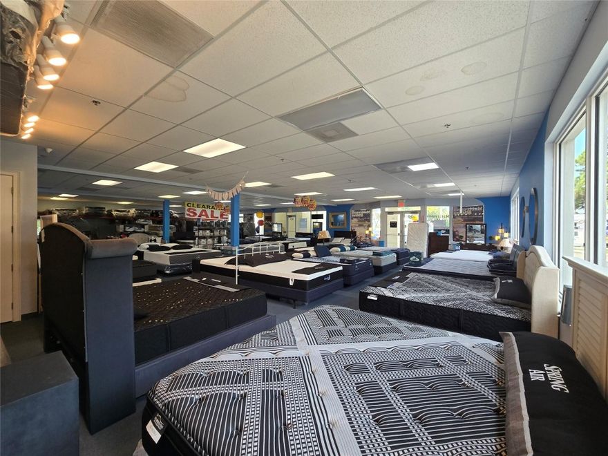 Retail/office condo unit available in Margate’s Plaza Las Americas! This 3746 +/-SQFT property is an excellent opportunity in a location with plenty of traffic. Currently set up as a mattress store. This retail condo is very spacious and can be easily divided into 3 units – allowing for new owner to use a portion for their business and lease or expand other portion(s) as needed. Frontage to State Road 7 with approximately annual average daily traffic of over 55,000 vehicles. Zoned in a transit oriented corridor district allowing for office and retail use. Plenty of parking. Contact for more information. NOTE: Owner willing to include the mattress store business in purchase at no additional price (although inventory would be sold separately).