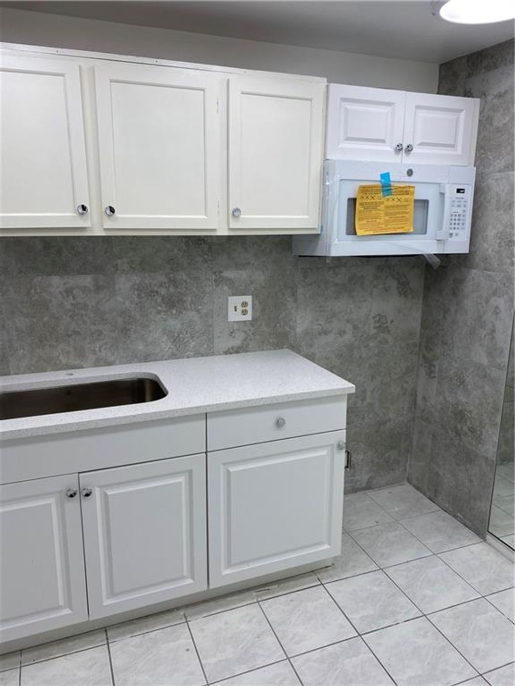 Photo of 3650 Inverrary Dr #1C, Lauderhill, FL 33319 (MLS # F10281009)