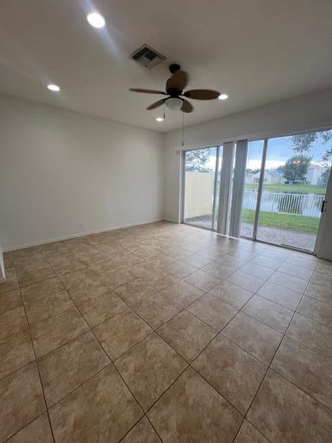 Photo of 130 Newberry Lane, Royal Palm Beach, FL 33414 (MLS # R10949116)