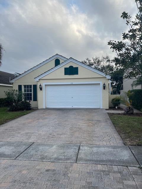 Photo of 130 Newberry Lane, Royal Palm Beach, FL 33414 (MLS # R10949116)