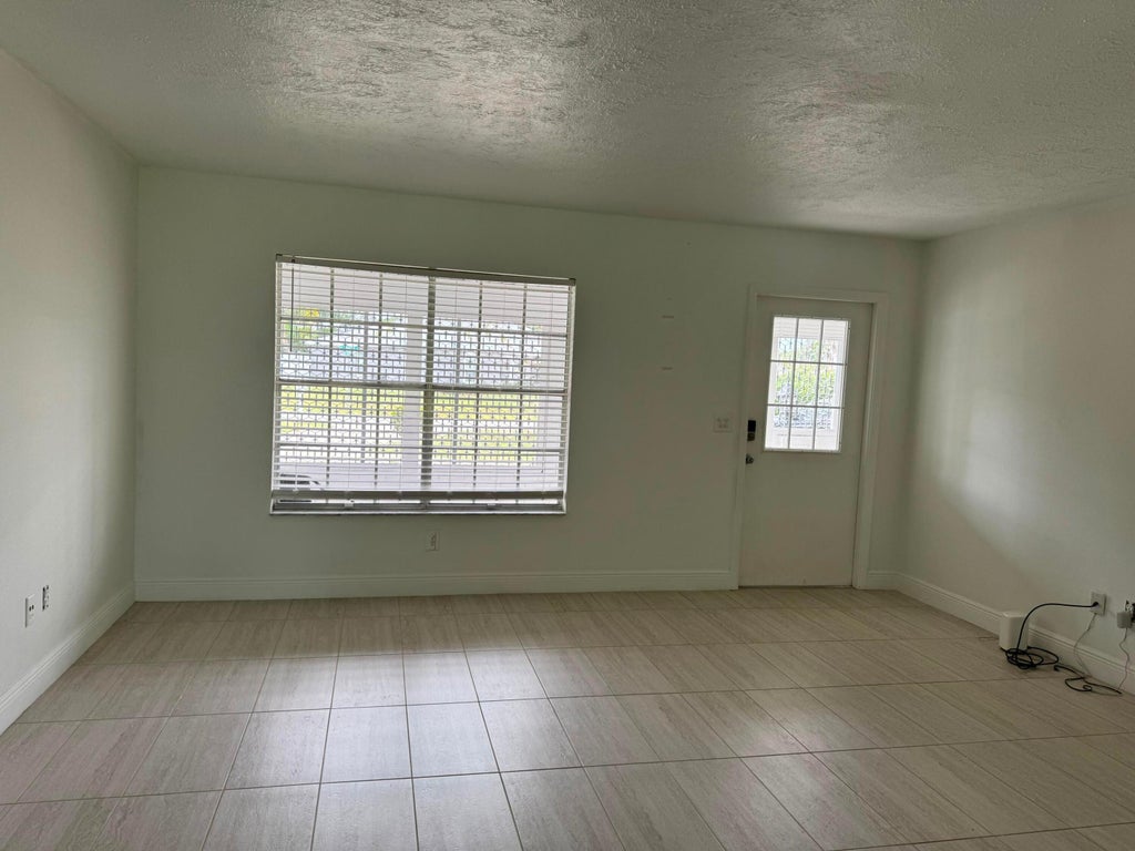 Photo of 1691 SE Goucho Avenue, Port Saint Lucie, FL 34952 (MLS # B26068919)