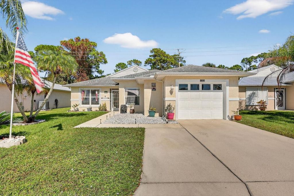 Photo of 13924 Aguila Avenue, Fort Pierce, FL 34951 (MLS # R11136965)