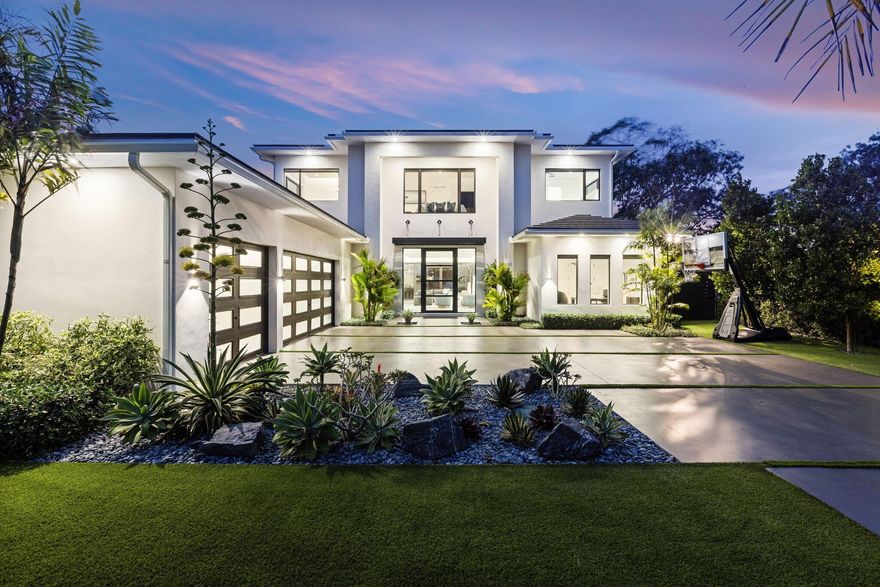 This remarkable waterfront residence is a newer construction marvel occupying just under a half-acre of prime real estate. This modern masterpiece boasts resort-style amenities and high-end finishes with a seamless design.Upon entering, the great room welcomes you with panoramic waterfront views, creating a seamless connection between the indoor and outdoor spaces. Featuring 5 bedrooms, 5.5 bathrooms, and a media room designed for entertainment and relaxation.Indulge in culinary delights in the expansive chef's kitchen, adorned with the highest quality appliances and fixtures. Marble & Quartz countertops, custom cabinetry, and a luxury wet bar with a 60-bottle wine wall enhance the culinary experience, making this kitchen a focal point of luxury and functionality. see more...