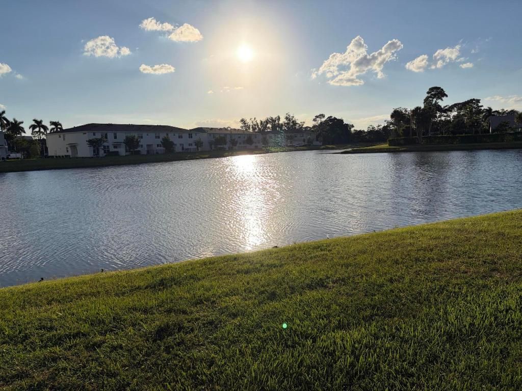 Photo of 4181 Lagoon Shore Drive, Lake Worth, FL 33467 (MLS # R11141583)
