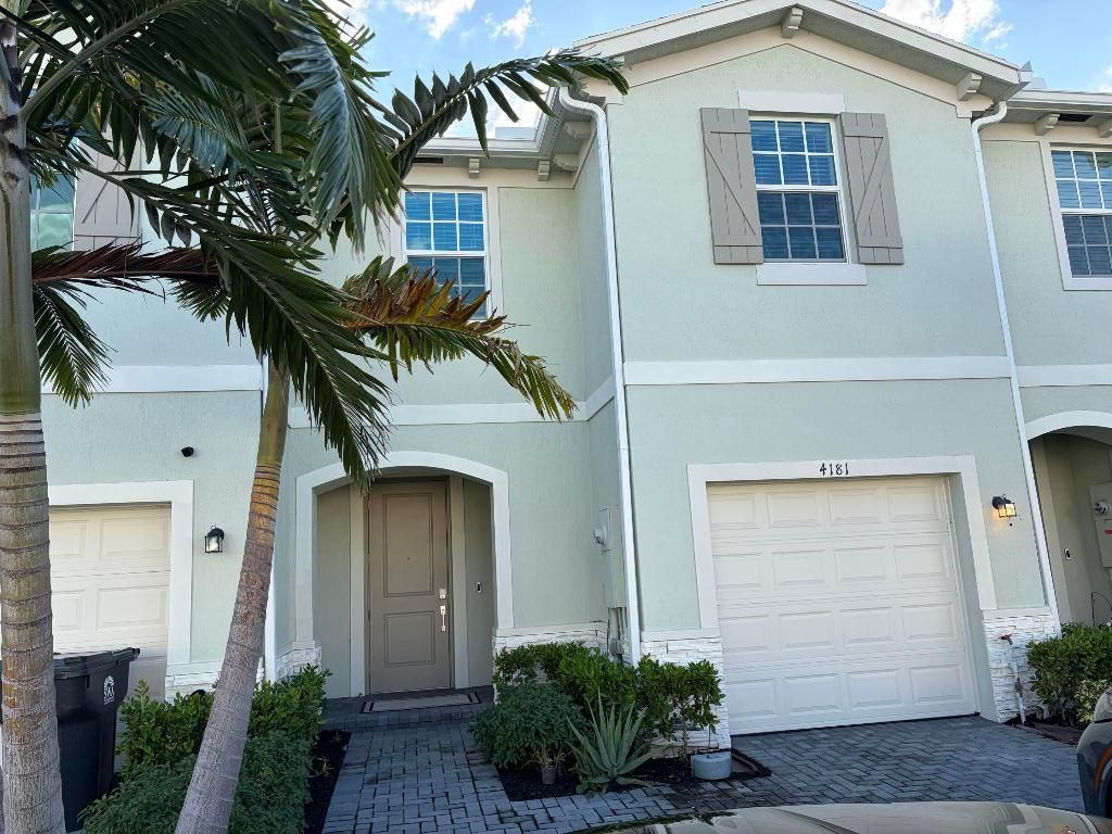 Photo of 4181 Lagoon Shore Drive, Lake Worth, FL 33467 (MLS # R11141583)
