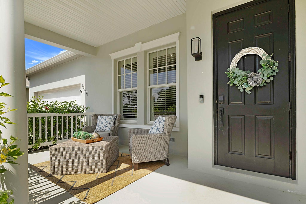 Photo of 10691 SW Waterway Lane, Port Saint Lucie, FL 34987 (MLS # B26077036)
