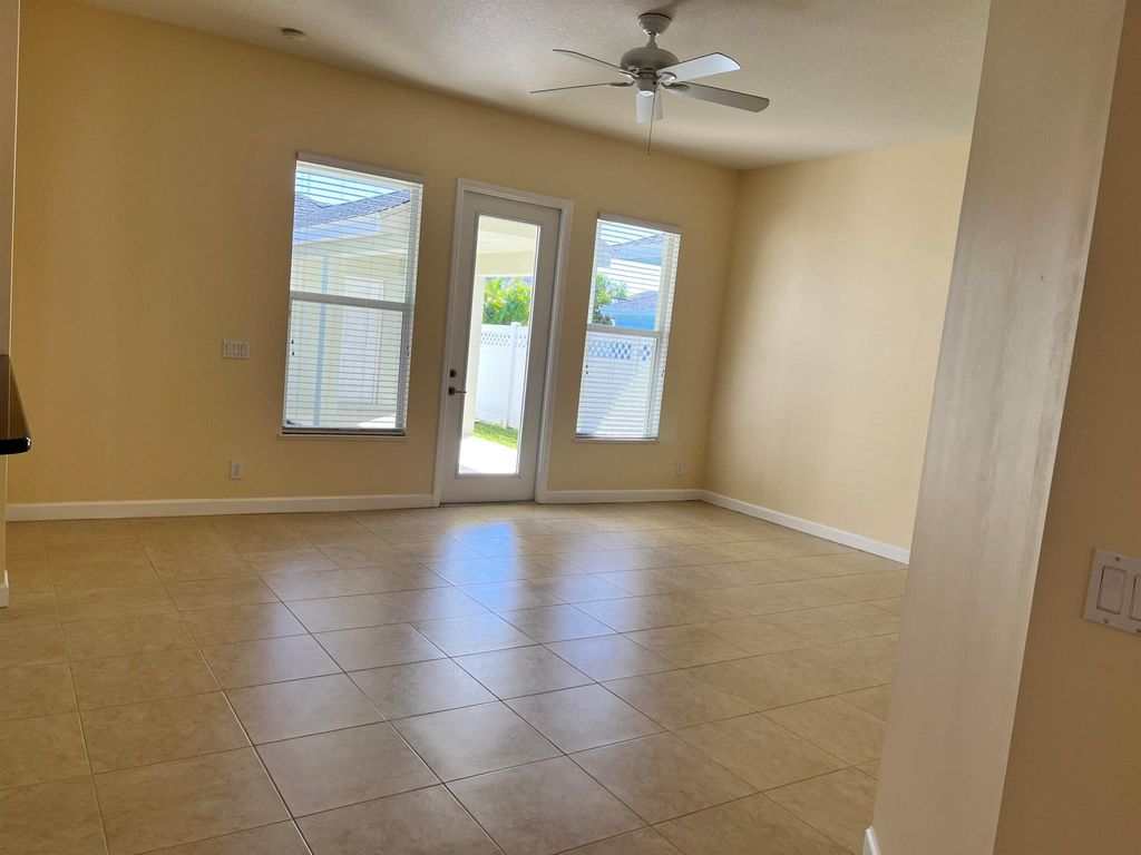 Photo of 10451 SW Kelsey Way, Port Saint Lucie, FL 34987 (MLS # R10963209)