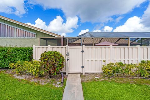 Photo of 5620 Eagle Lake Drive, Palm Beach Gardens, FL 33418 (MLS # B26012243)