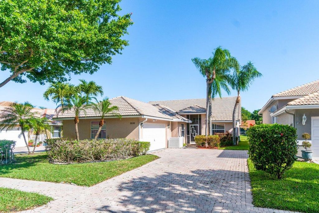 Photo of 5530 Grande Palm Circle, Delray Beach, FL 33484 (MLS # R10976095)