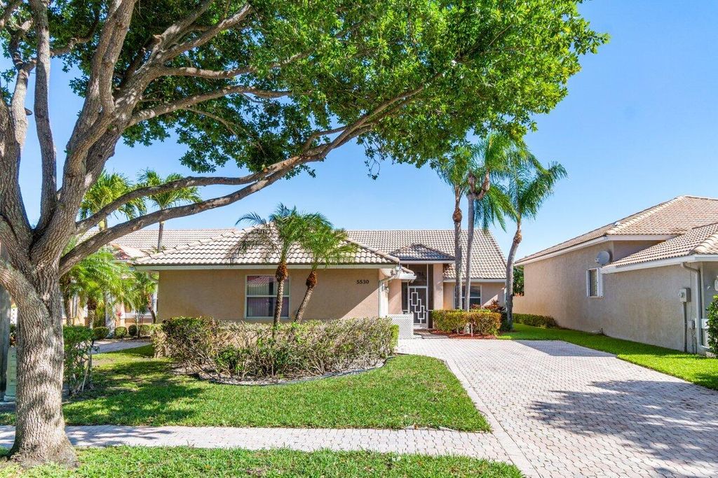 Photo of 5530 Grande Palm Circle, Delray Beach, FL 33484 (MLS # R10976095)