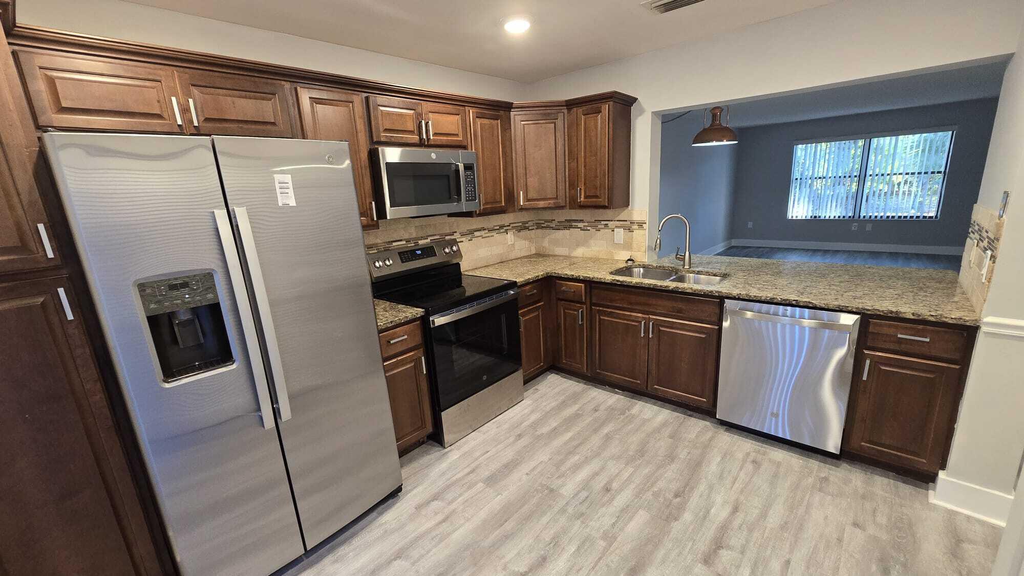 SHEFFIELD WOODS AT WELLINGTON COND - Residential Lease