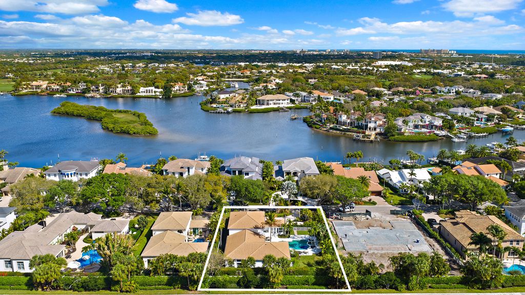Photo of 325 Eagle Drive, Jupiter, FL 33477 (MLS # B26013416)