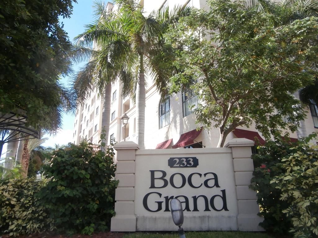 Wonderful two bedroom two bath 4th floor apartment in the heart of downtown Boca! This apartment has the most desirable exposure in the building - East! Enjoy the pleasant east breezes from your balcony. Beautiful wood laminate flooring throughout. Two garage parking spaces (most here only come with one). Brand new range, Refrigerator 1 year old, A/C 2 years old. Available for annual unfurnished lease immediately. Elevators in the building. Downtown Boca!