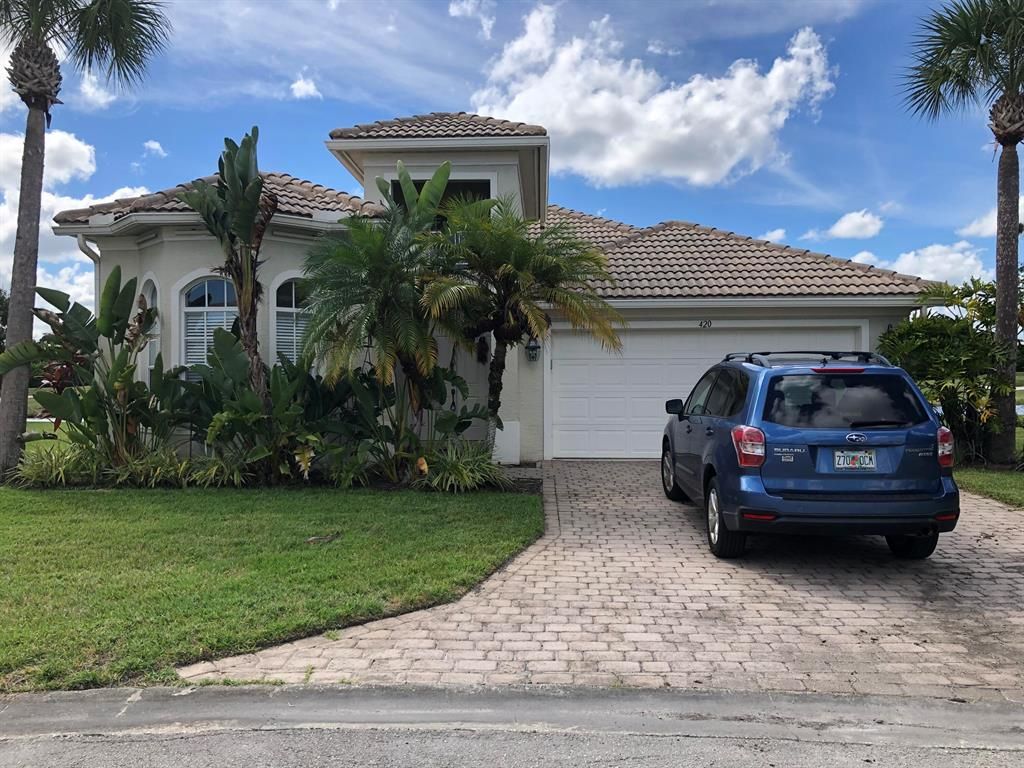Photo of 420 NW Stratford Lane, Port Saint Lucie, FL 34983 (MLS # R10752631)