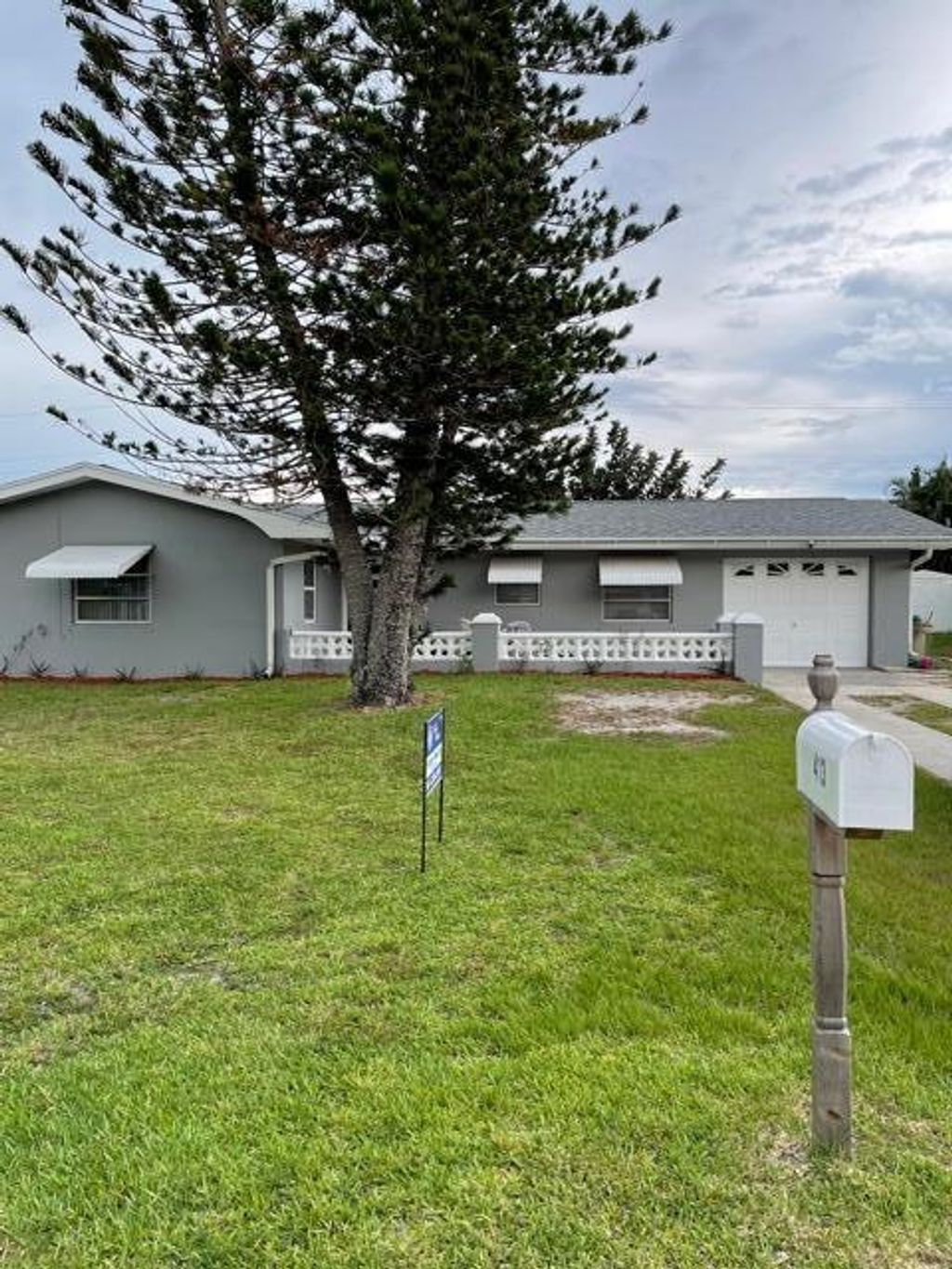 Photo of 413 NE Oleander Avenue, Port Saint Lucie, FL 34952 (MLS # R10723632)