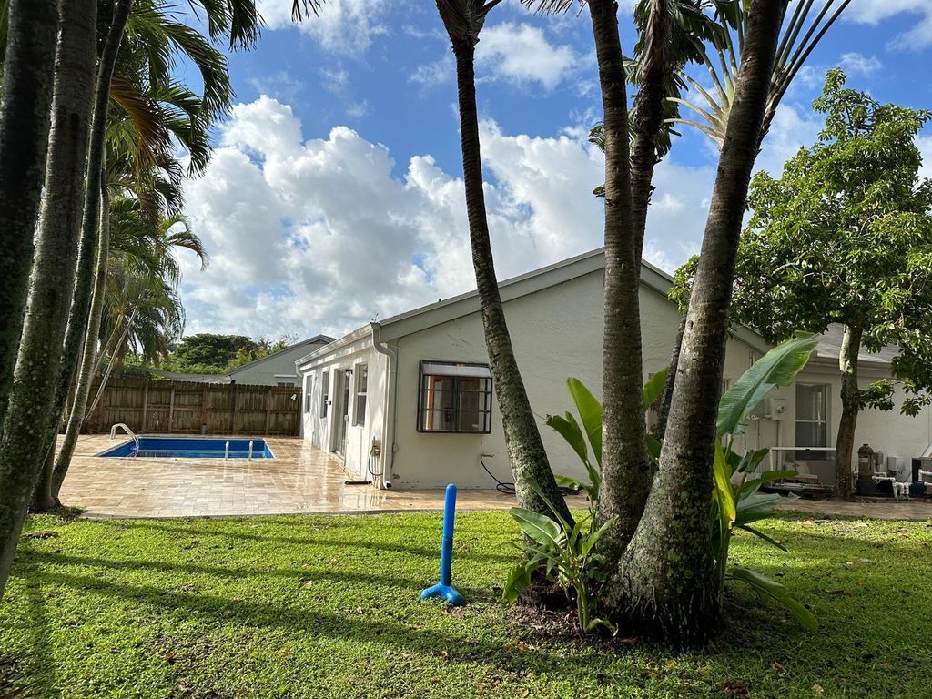 Photo of 9841 Ridgecreek Road, Boca Raton, FL 33496 (MLS # B26006215)