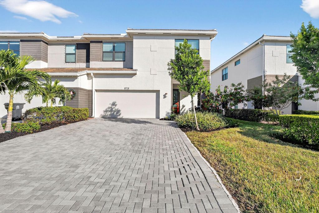 Photo of 8731 Antarus Drive, Lake Worth, FL 33467 (MLS # B26025947)