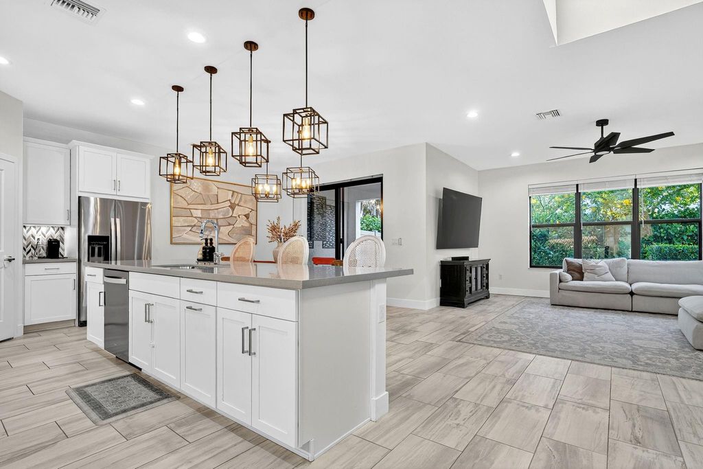 Photo of 8731 Antarus Drive, Lake Worth, FL 33467 (MLS # B26025947)
