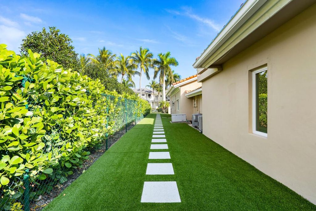 Photo of 533 E Alexander Palm Road, Boca Raton, FL 33432 (MLS # R10949104)