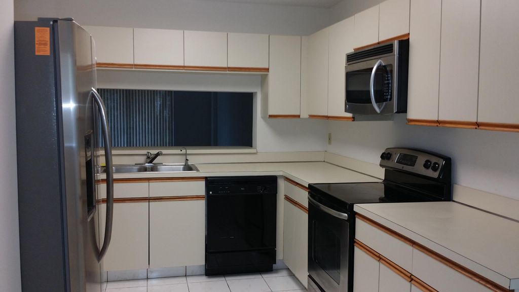 Photo of 4725 Lucerne Lakes Boulevard E #106, Greenacres, FL 33467 (MLS # B26007157)