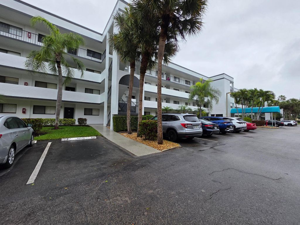 Photo of 4725 Lucerne Lakes Boulevard E #106, Greenacres, FL 33467 (MLS # B26007157)