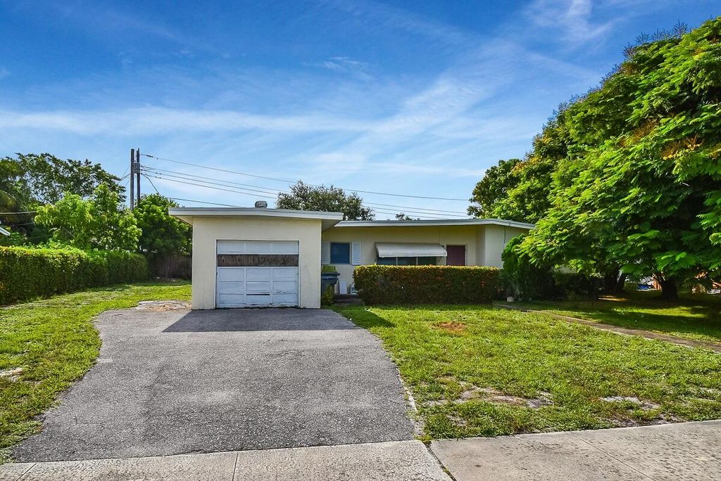 Photo of 1005 7th Street, Lake Park, FL 33403 (MLS # R10937657)