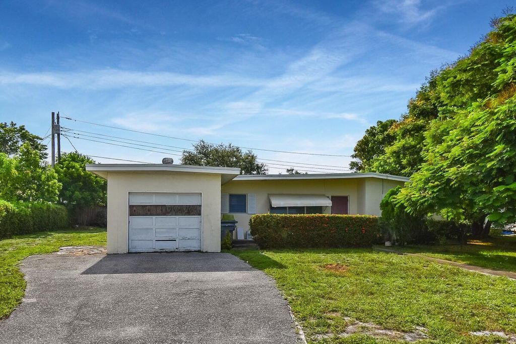 Photo of 1005 7th Street, Lake Park, FL 33403 (MLS # R10937657)