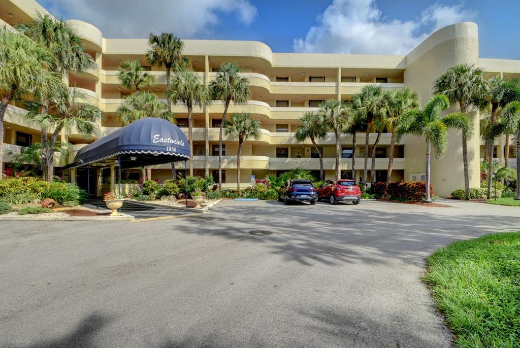 Centrally located, 2 bed 2 bath condo in Eastwinds community. Peaceful lake view with a screened in patio. Updated kitchen with granite countertops and newer SS appliances. Private washer/dryer in-unit laundry. All age, pet friendly community. Building amenities include gym, pool, clubhouse, sauna, and tennis courts. Water, cable and building insurance are also included in low HOA dues. Close to the beach, Atlantic Ave, and major highways.