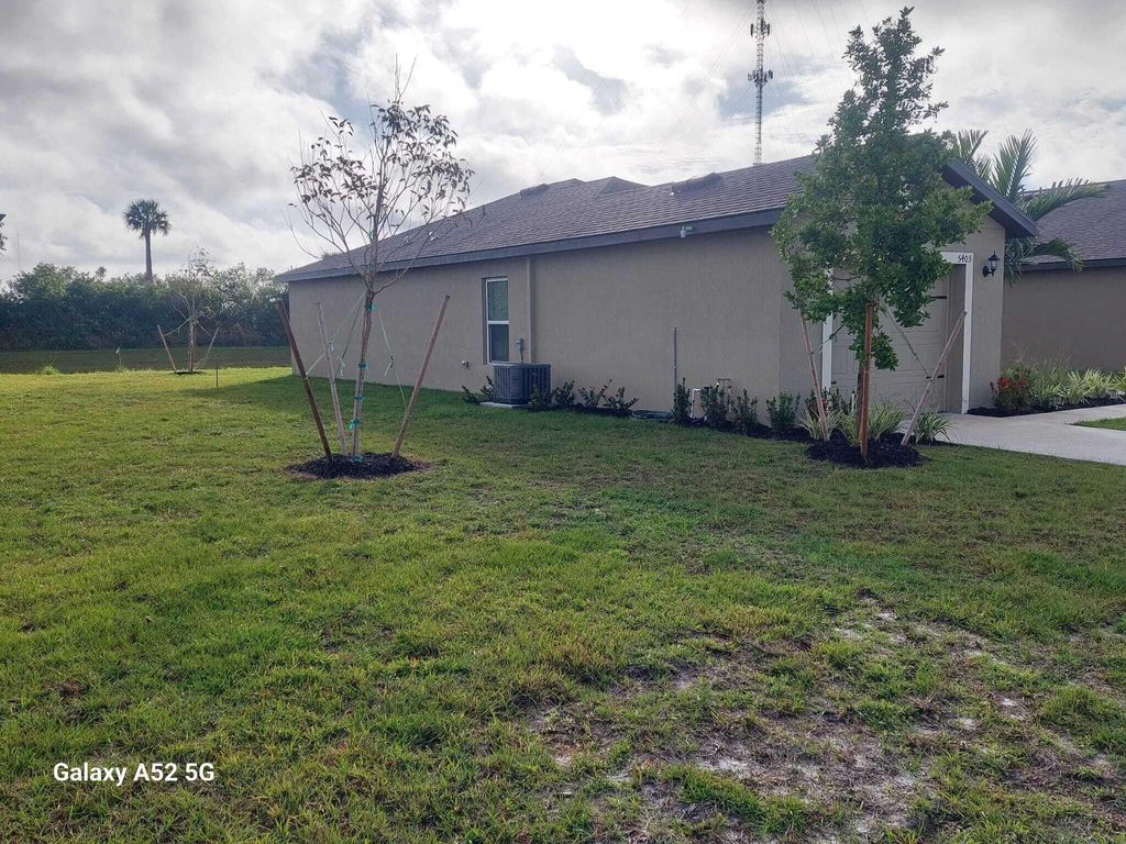 Photo of 5405 Fantasy Drive, Fort Pierce, FL 34947 (MLS # R11099423)