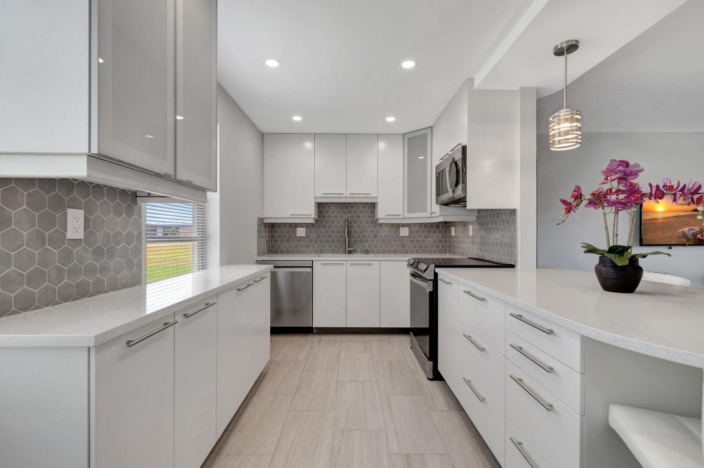 Photo of 164 Normandy D, Delray Beach, FL 33484 (MLS # R11122743)