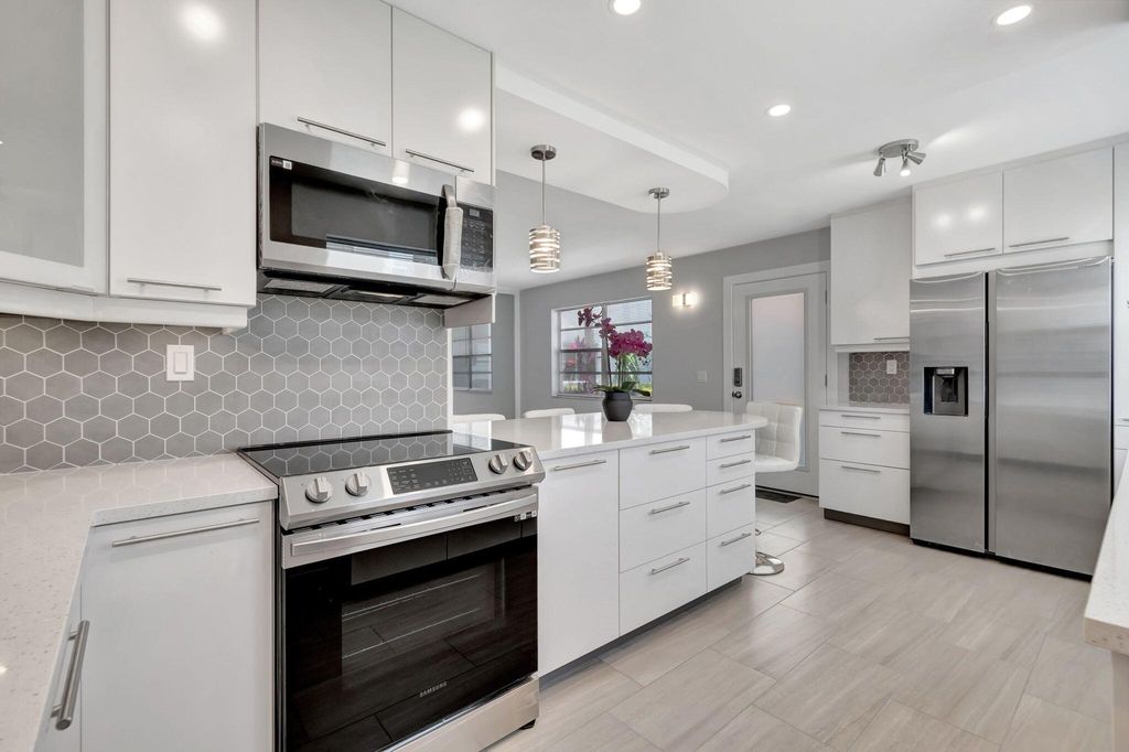 Photo of 164 Normandy D, Delray Beach, FL 33484 (MLS # R11122743)