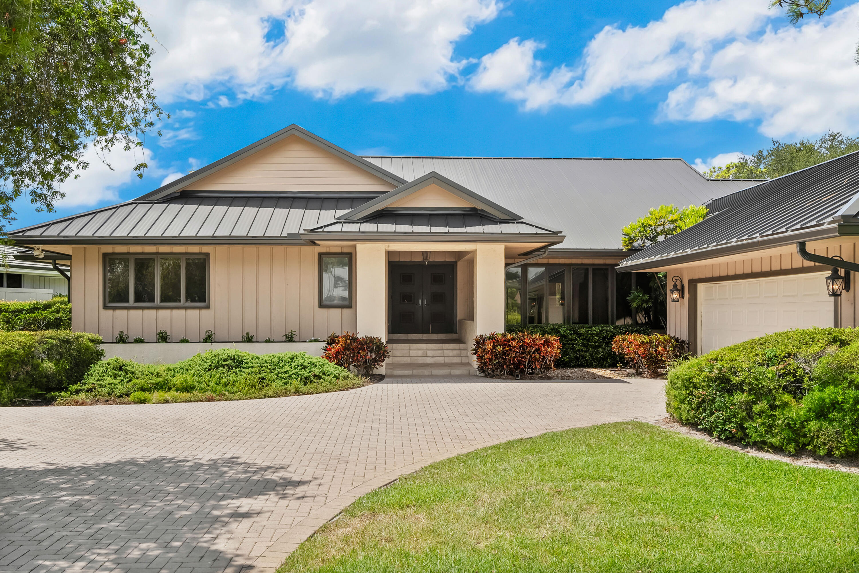 Opportunity Knocks in Mariner Sands Country Club!This spacious 2,965 sq ft, 3-bedroom, 3-bath home is ideally situated in the heart of Mariner Sands, offering panoramic golf course views, a brand-new metal roof, and incredible potential.Inside, you'll find soaring ceilings, a large open living area, and a thoughtful layout that includes a primary suite with two walk-in closets, a guest suite with a cabana bath, and an oversized laundry room. The screened lanai and pool area overlook the lush fairway, creating the perfect space to reimagine and personalize to your taste. The home also features a newer garage door (2020) and two new AC units (2024), with golf cart storage in the garage for added convenience.