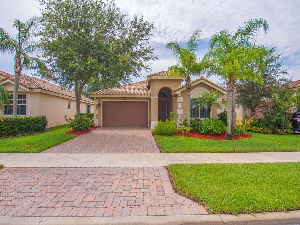 Photo of 2287 SW NEWPORT ISLES Boulevard, Port Saint Lucie, FL 34953 (MLS # B26063156)