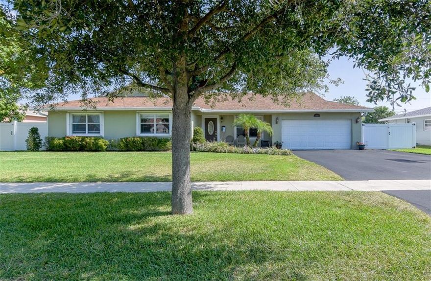 Spacious 4/3 Located in Quiet, Family Orientated, Plantation Park Neighborhood on Low Traffic Street. Open Concept Living Room, Den & Dining Area. Updated Windows and doors with Accordions Throughout. Kitchen has Granite Counters, Stainless-Steel Appliances and Pass Thru Window to Large Cedar Ceiling, Brick Paver Patio and Deck, overlooking Heated Kidney Shaped Pool with Child Safety Fence. Large Vinyl Fenced Yard with Shed & Koi Pond. Generator Transfer Switch in the 2 Car Garage with Exterior Generator Power Plug. Biannually serviced, Ice Cold A/C with NEW Duct Work Throughout. Tank-less Water Heater. Walking distance to Elementary, Middle & High Schools as well as Heritage Park! Close to Shopping, All Major Highways, Airport, Port Everglades and Hospitals. NO HOA - MUST COME SEE!